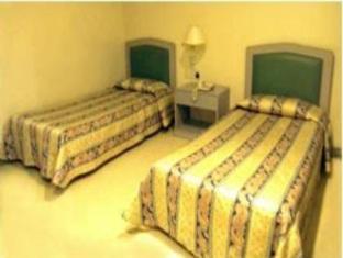Top Plaza Hotel Диполог Екстериор снимка